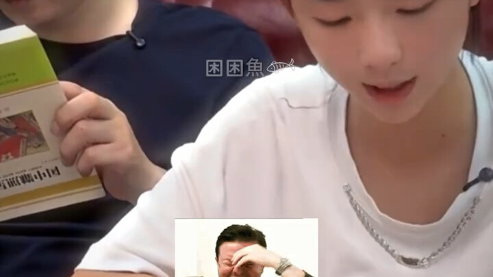 The girl is doing her homework when a classmate calls—but she’s actually playing a game!