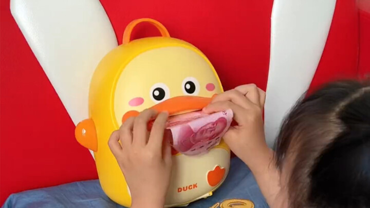 Kid’s piggy banks these days are seriously next-level! Haha.