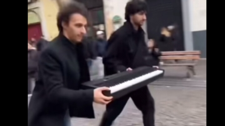 Randomly testing passersby’s piano skills on the street