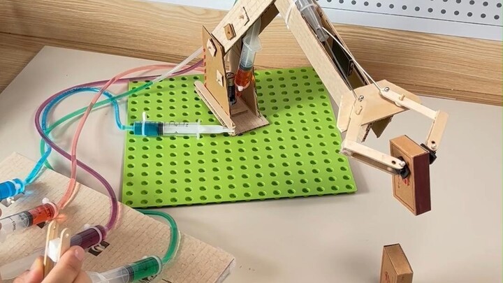 Challenge: Stacking Matchboxes with a Hydraulic Robotic Arm