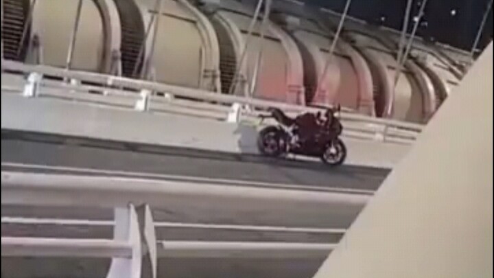 Holy crap, the biker girl fell off the bridge!