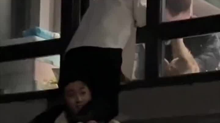 A guy is carrying a girl on his shoulders while she’s on a date with her boyfriend; the guy standing