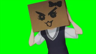 Nina with a cardboard box on her head.GB (with examples)