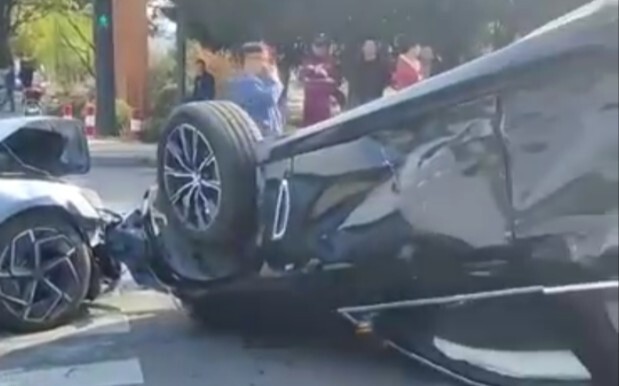 BYD Seal T-bones a BMW X5, leaving it flipped over; driver emerges unscathed and calmly gets out to 