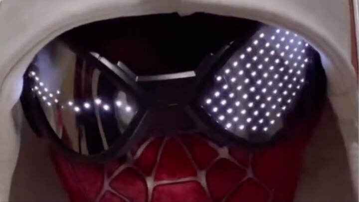 The Spider-Man Goggles from Disney's Avengers Campus. Mimic expression Spidey's.