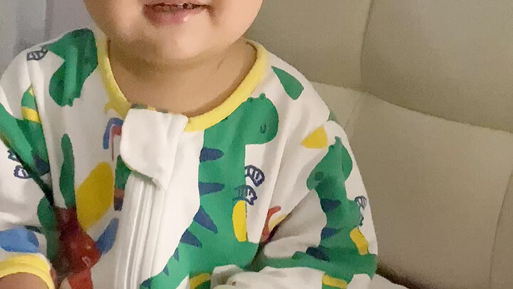 The little dinosaur woke up hungry in the middle of the night and secretly ate some cookies—only for