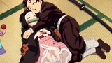 "Nezuko is so well behaved lying in her brother's arms, so adorable!