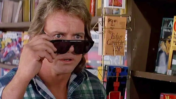 When the man puts on the magical sunglasses, he discovers that all humans have turned into skulls!