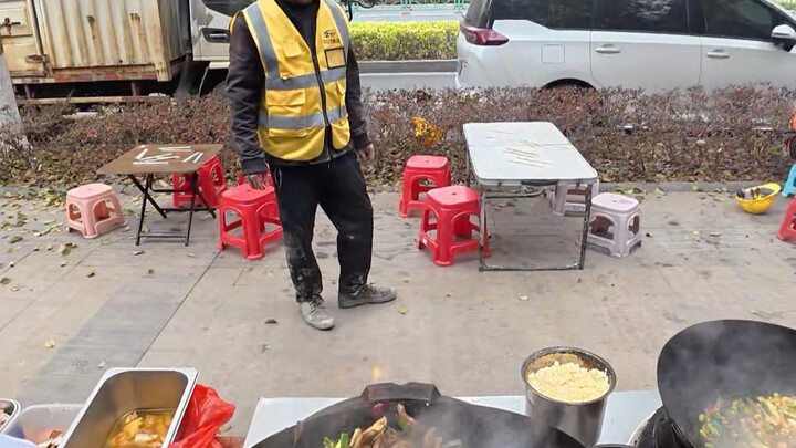 Street Food Cooking at a Construction Site