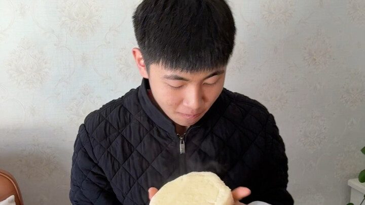 This kid is such a hustler, but the steamed buns really delivered—wobbly and uneven as they went in,