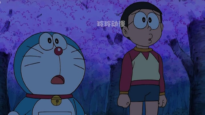 Cô bé Dora tan nát cõi lòng để giúp Nobita thực hiện việc ngắm hoa cùng mọi người.