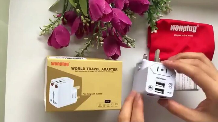 Portable travel adapter with 2USB and 2 fuse