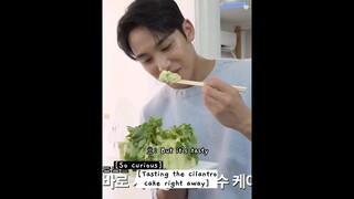 mingyu trying out the cilantro cake 🌿🎂 #seventeen #mingyu