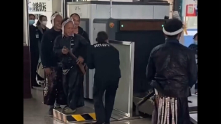 What kind of people are these! Riding the train with guns