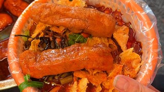 Bihun siput di jalan-jalan Liuzhou, tambahkan sebutir telur goreng yang baru digoreng, celupkan hing