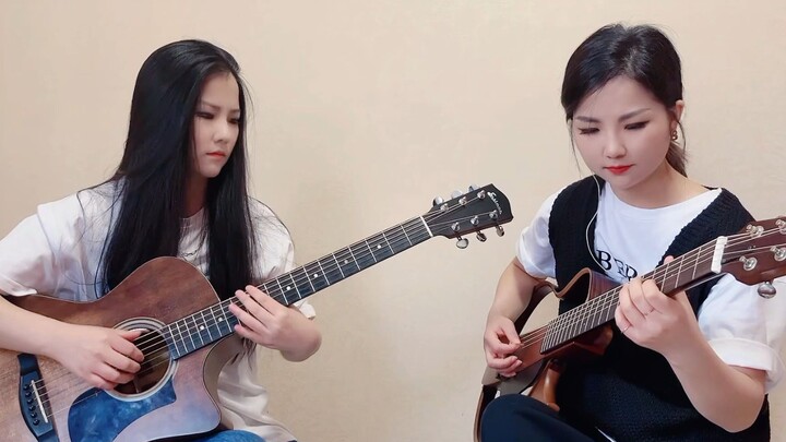 ฝาแฝด Xiaoqi และ Black Cat ในเฟรมเดียวกัน "Love Jiangshan More Love Beauty" / Beishang Guitar