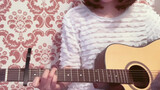 A girl covered Taylor Swift's "Love Story" with guitar in white