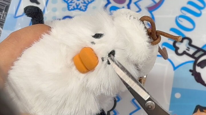 Cara universal memperbaiki bulu boneka berbulu panjang