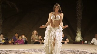 Belly dance in desert