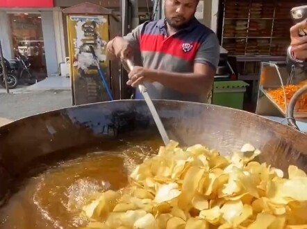 This freshly fried potato chip made me seriously hungry just by watching it.