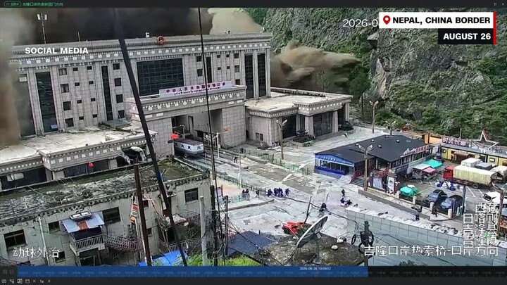 Security camera footage shows the shocking moment flood water crashes through the Nepal-China border