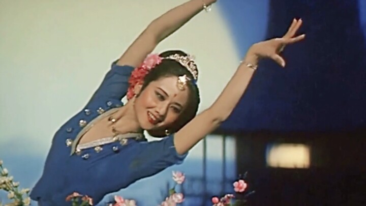 Stunning, she is like an elegant and sacred green peacock