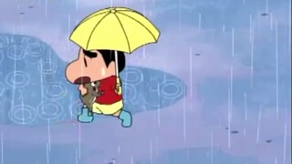 Shinchan wants to save the frog even if he gets wet in the rain