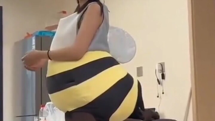 The little bee has come to collect nectar!