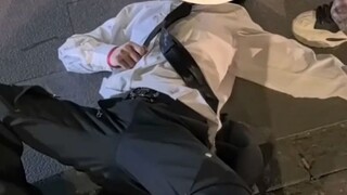 A male model, drunk out of his mind, collapsed and wept bitterly by the roadside, screaming at the t