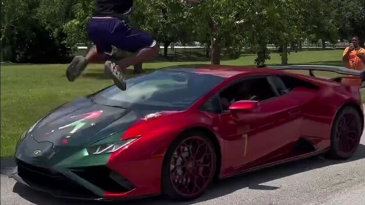 Speed shows off his incredible jump over an oncoming Lamborghini