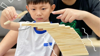 The 20th one can completely extend beyond the edge of the table. This is the Leaning Tower of Rila.