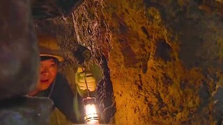 A man dived into an ancient well to look for treasure and unexpectedly found 800 gold bricks