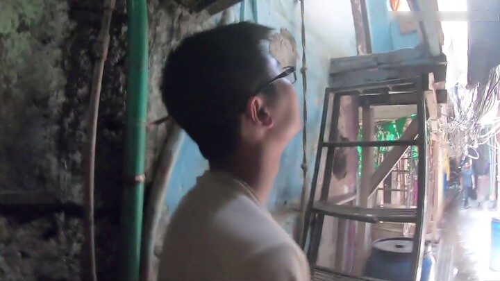 There is no water in the slums of India, so I borrow water from my neighbors to take a bath