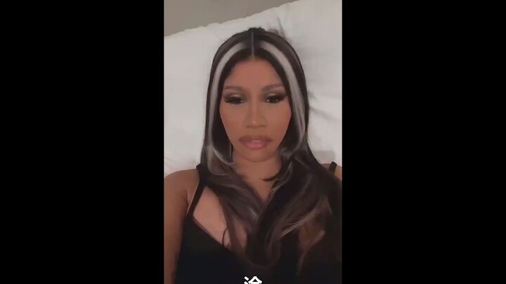 Cardi B trying a live filter