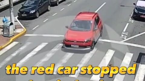 the motorcycle hit the red car