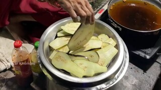 Woman Selling Brinjal Pakoda