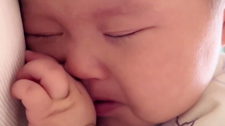 A five-month-old baby wakes up and starts crying with such a soft, sweet voice—so adorable!