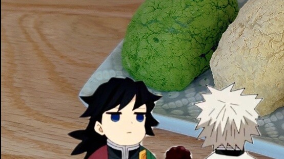 هل يمكن استخدام كعكة هاغي لتحسين العلاقة مع فوتاكيوا؟ تحدٍ غذائي من فيلم Demon Slayer: يوشيتو كوماغا