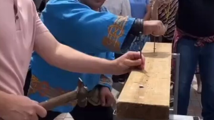 Hand-hammering nails
