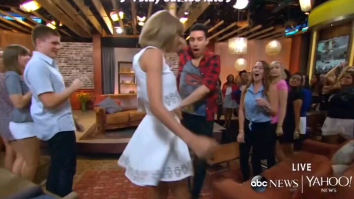 Taylor Swift personally demonstrates the standard dance moves for "Shake It Off"