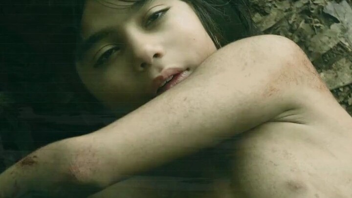 A boy yanks up a hundred-meter-long snakeskin in one swift pull.