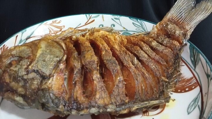 Fried fish, crispy as hell—no bones left!