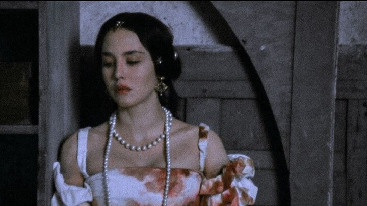 “She doesn’t care about the rain; her life has been shrouded in perpetual gloom.”