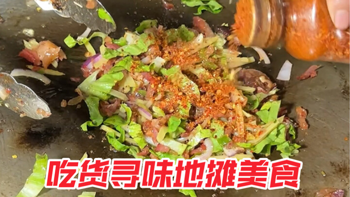 A steaming bowl of spicy mala tang—the boss really cranks up the chili! The grilled meat sizzles wit