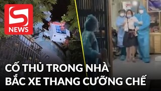 Dùng xe thang cưỡng chế  F1 cố thủ trốn trên tầng 3 không chịu cách ly ở Bắc Giang