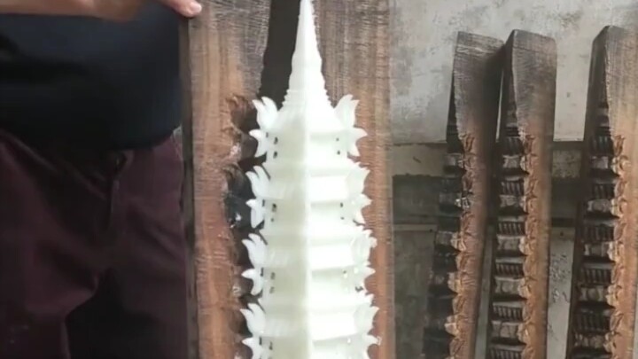The traditional handmade sugar tower is crafted with astonishing realism.