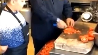 The father is very proud of his son's cooking skills