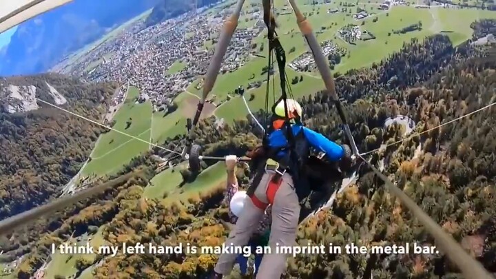 The staff forgot to secure the passenger to the paraglider, but luckily the passenger had an astonis