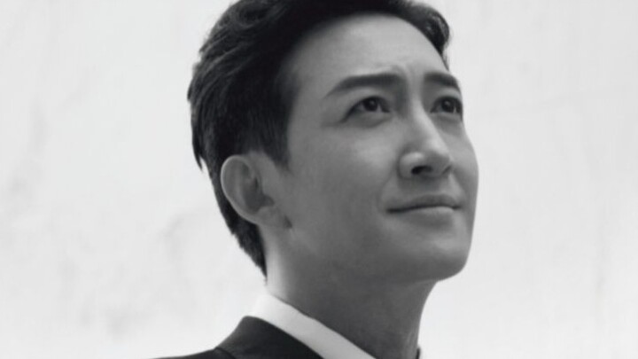 "He was dressed in a black and white suit, but he was as gorgeous as a rose."