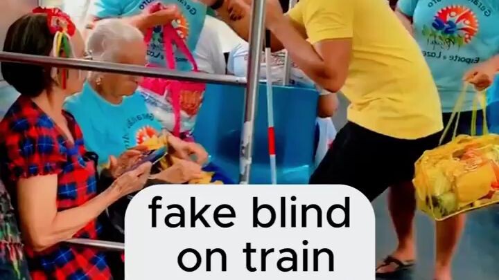 # blind man in train